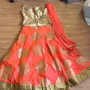 Orange and Gold Lehengha. Never worn. Was too small then too big.🙁 Gorgeous. XL.